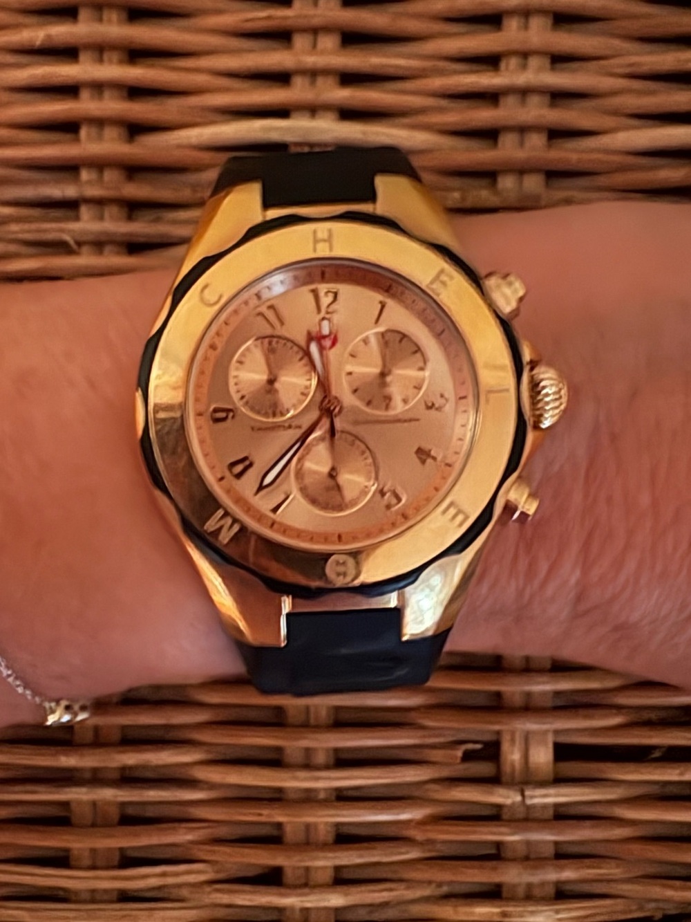 Black and gold Michele watch